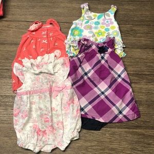 4 piece set of outfits. 3 are 3month and 1 is 6-9